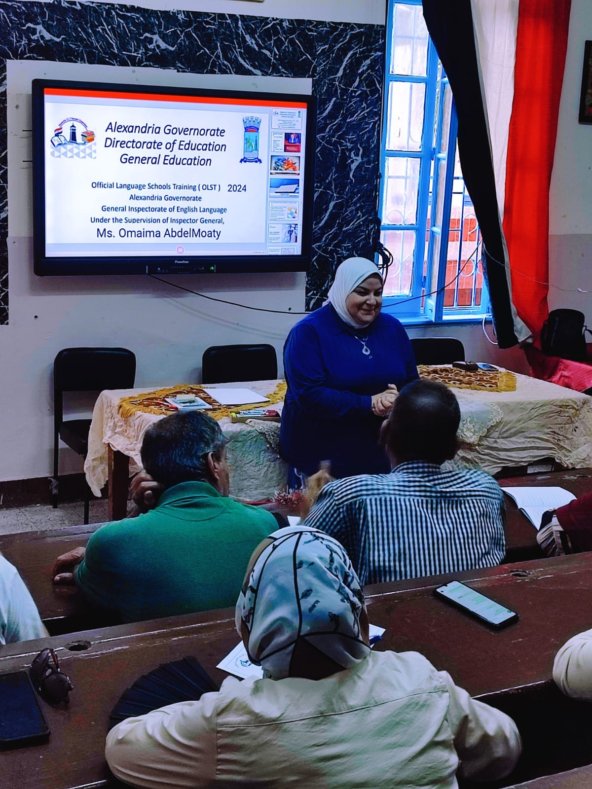 eman bekheet presents to teachers in attendance at workshop