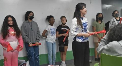 Wang Rennyu with some of her students. 