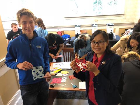 Wang Ling with one of her former students.