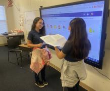 After creating shopping dialogues, students will perform in front of the class. 